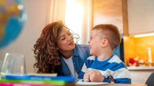 Mother and son laughing - Investing in Your Child's Future - Wealth Connexion