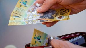 Person getting Australian dollars on wallet - Wealth Connexion image