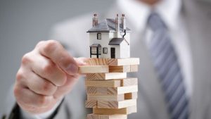 Jenga Block With a House on Top - Wealth Connexion Blog Image