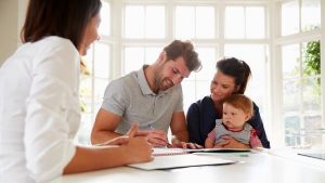 A family having a conversation with an agent - Wealth Connexion