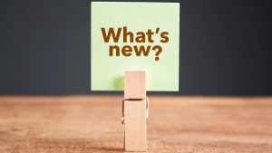 A wooden clip with a note with 