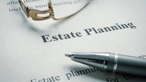 Estate planning document with a pen and glasses | Wealth Connexion blog image