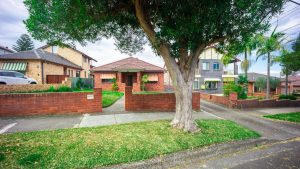 Brick houses beside the street | Wealth Connexion blog image